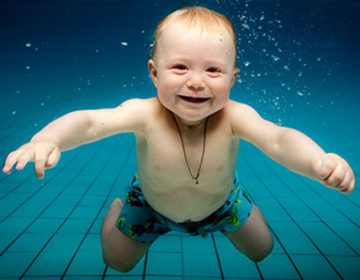 Baby swim by Eythor Árnason