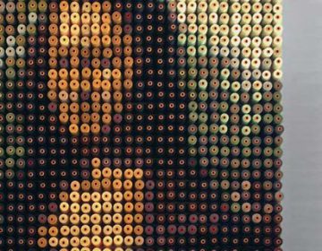 MONA LISA MADE FROM 1,292 SPOOLS OF THREAD
