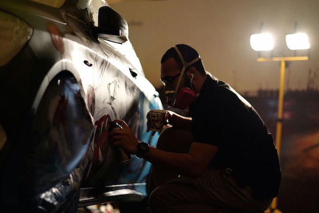 Live Graffitti on Mercedes-Benz Photo © Majed Al Bahiti