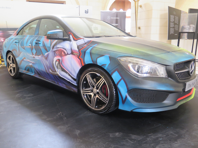 Live Graffitti on Mercedes-Benz Photo © Sulafa Kurdi