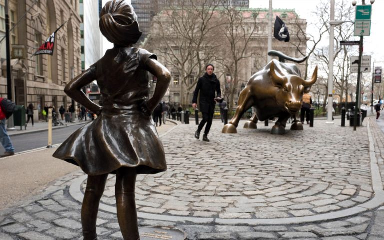 The fearless girl and the charging bull