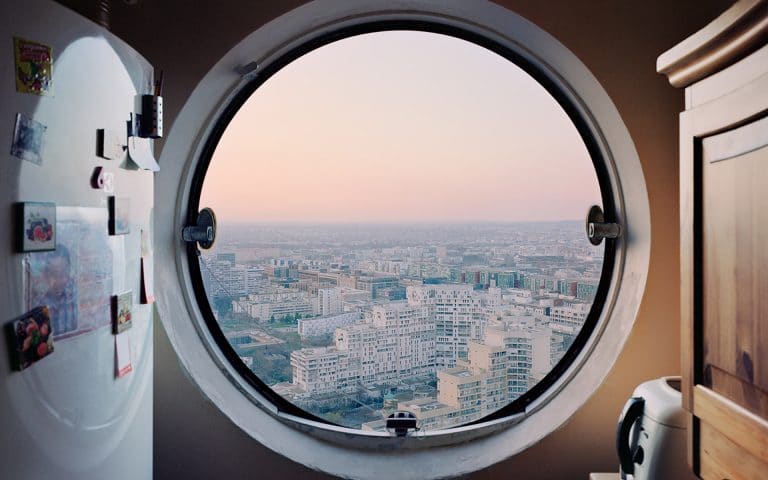 “Les Yeux des Tours” is a porthole windows photography series