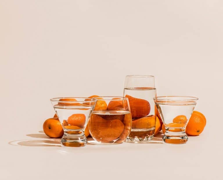 Food distorted through liquid and glass in photography