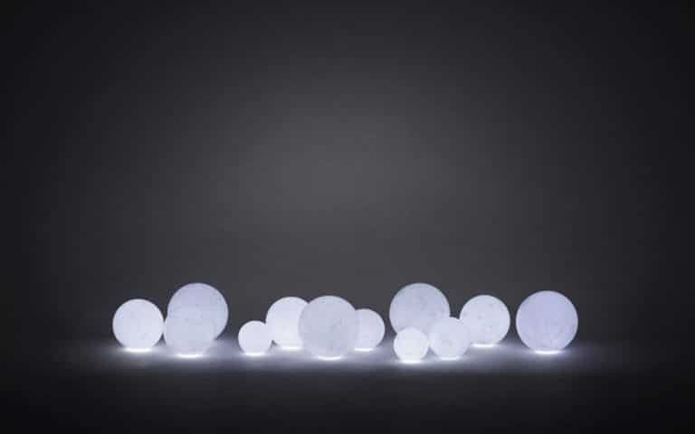 Moon-Like vases made from layered wax by we+