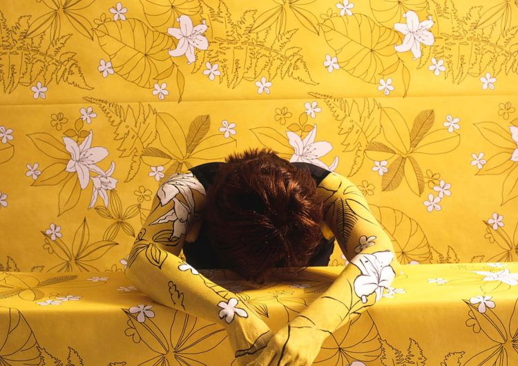 Camouflages Herself Into Floral Wallpaper And Fabric