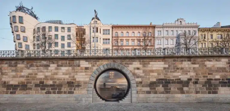 Circular Vaults Embedded within a Prague Embankment Contain Shops, Cafes, and Public Spaces
