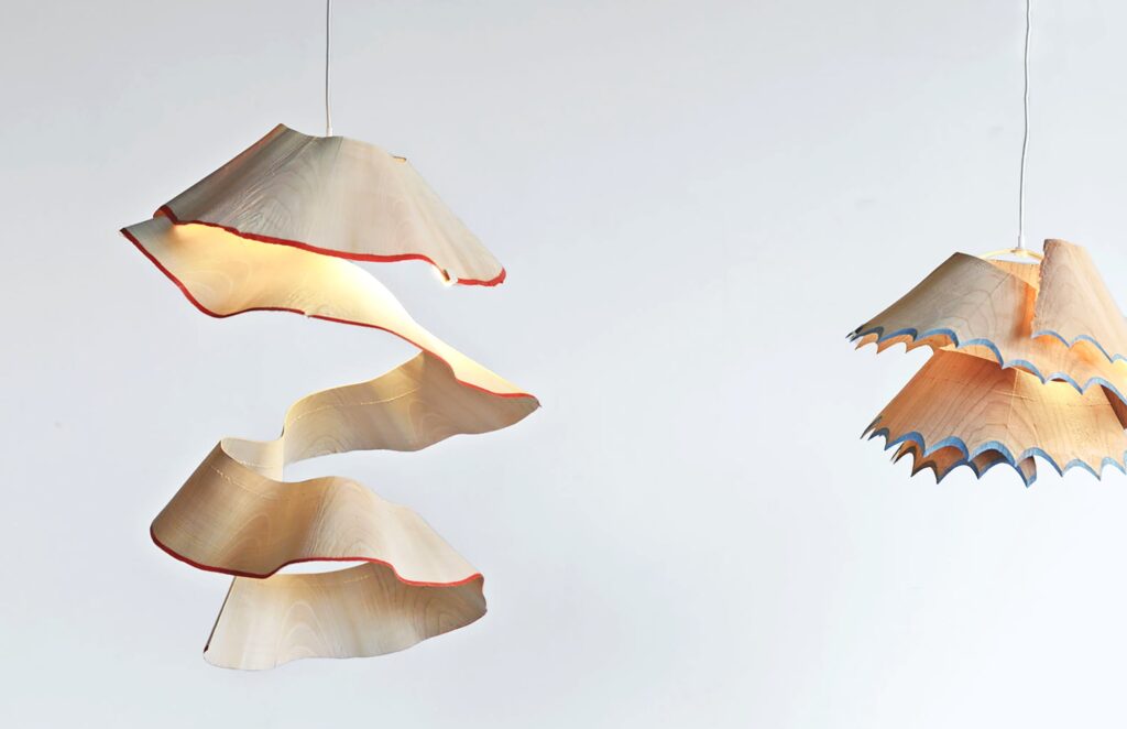 A Giant Sharpener Creates Playful Pendant Lights That Mimic Colored Pencil Shavings