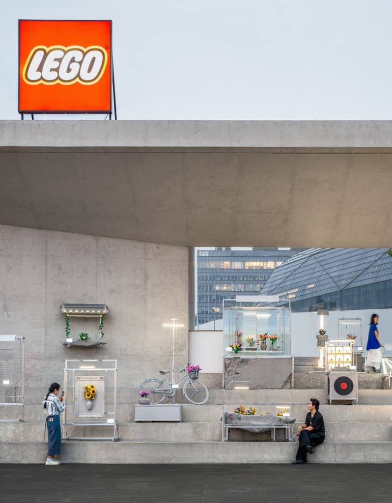 Pavilion displaying finished LEGO Botanicals sets in everyday settings