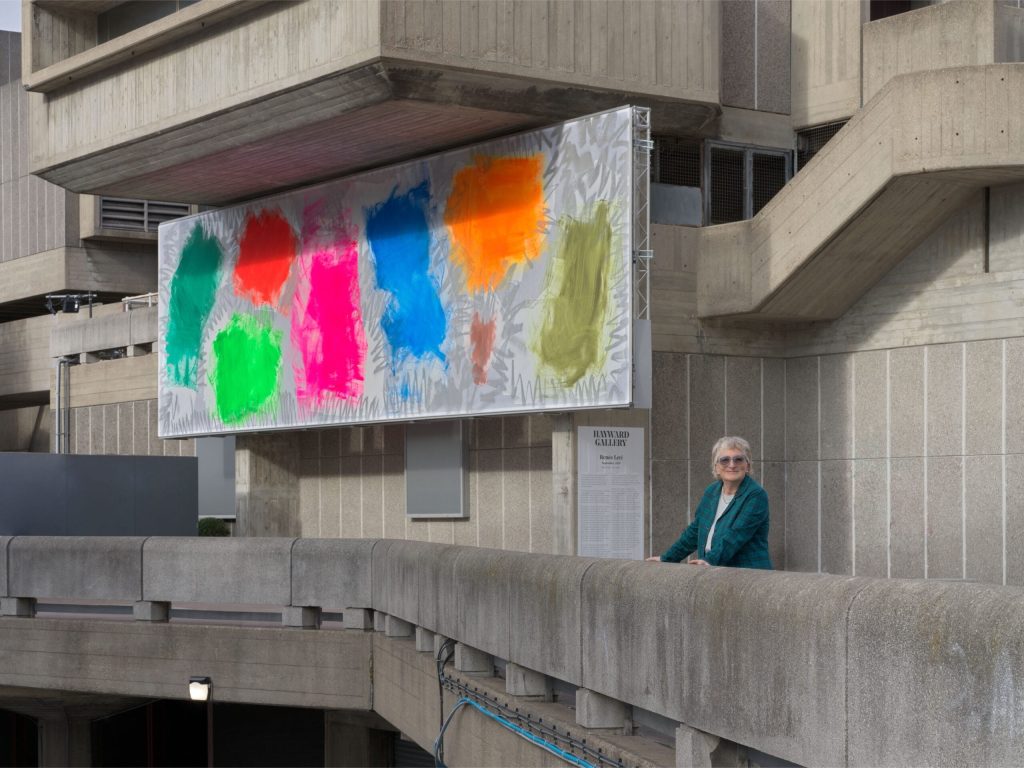 Renée Levi standing in front of her artwork September at the Hayward Gallery