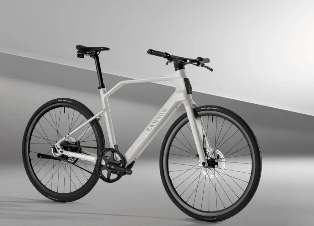 Front three quarter view of the white Canyon Predict road bike