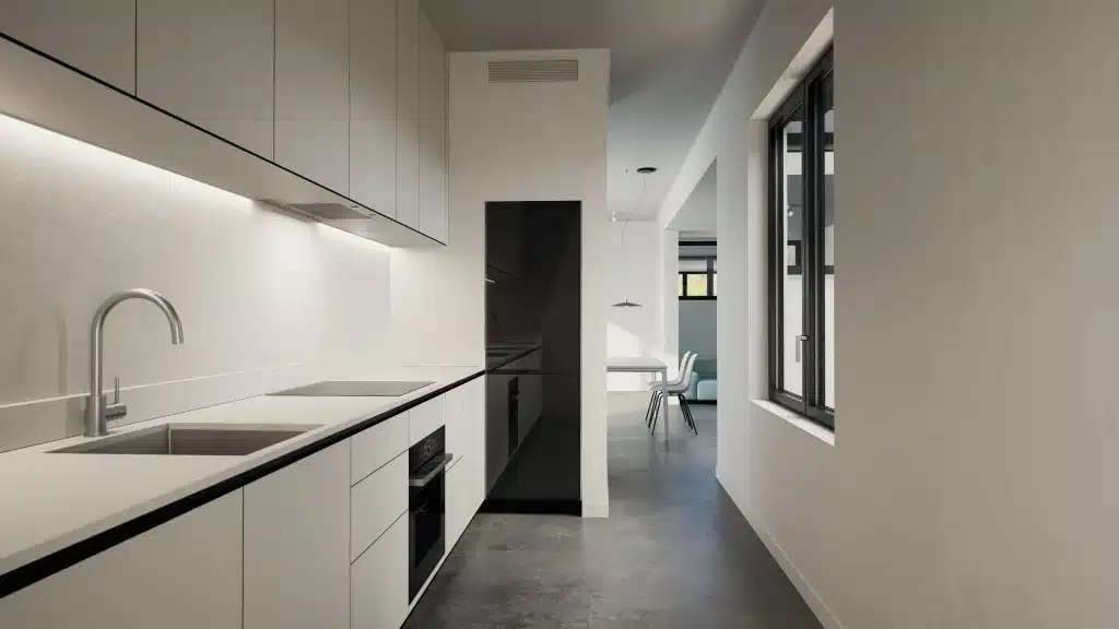 White linear kitchen with black worktop inside Monocabin XL5