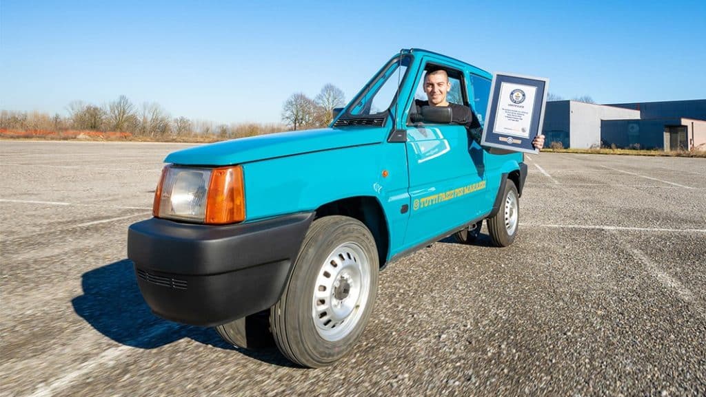 Andrea Marazzi standing next to his single seat Fiat Panda, 50.2 cm wide